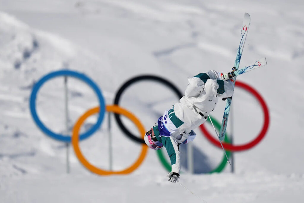Cooper Woods upsets Mikael Kingsbury for Olympic gold in men’s moguls in a tiebreaker