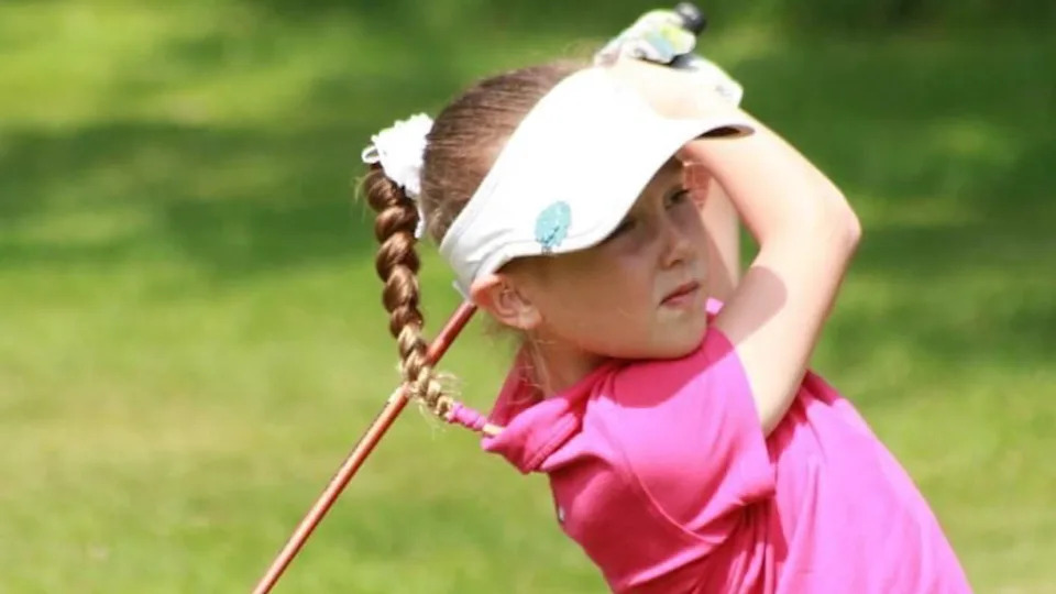 A young Ffion Tynan plays a shot