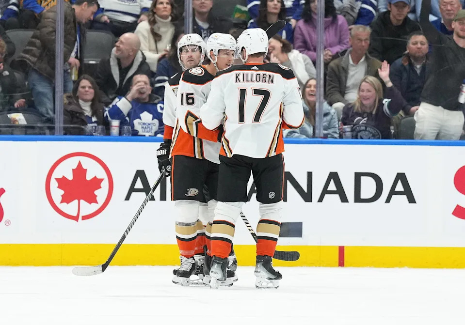 Feb 17, 2024; Toronto, Ontario, CAN; Anaheim Ducks center Ryan Strome (16) scores a goal and celebrates with left wing Alex Killorn (17) against the Toronto Maple Leafs during the third period at Scotiabank Arena. Mandatory Credit: Nick Turchiaro-Imagn Images