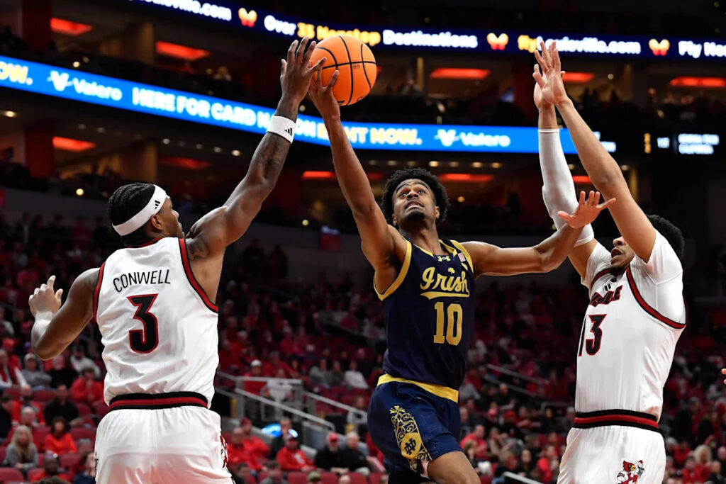 Ryan Conwell, Khani Rooths each score 12 to help No. 24 Louisville outlast Notre Dame 76-65