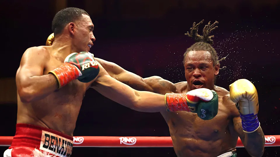 RIYADH, SAUDI ARABIA - NOVEMBER 22: (L-R) David Benavidez exchanges punches with Anthony Yarde in a WBC and WBA light-heavyweight title fight during Ring IV: Night of the Champions at ANB Arena on November 22, 2025 in Riyadh, Saudi Arabia.  (Photo by Richard Pelham/Getty Images)