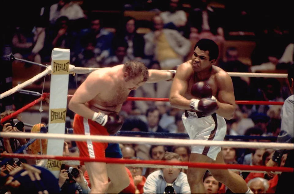 UNITED STATES - MARCH 24:  Boxing: WBC/WBA Heavyweight Title, Muhammad Ali (R) in action vs Chuck Wepner (R) at Richfield Coliseum, Richfield, OH 3/24/1975  (Photo by Tony Tomsic/Sports Illustrated via Getty Images)  (SetNumber: X19414)