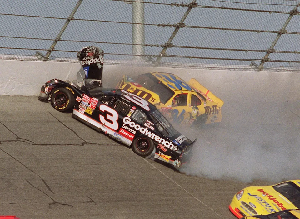 Dale Earnhardt (3) is hit by Ken Schrader (36) in turn four of the last lap of the Daytona 500 at Daytona International Speedway in Daytona Beach, Fla., Sunday, Feb. 18, 2001. Earnhardt, the greatest stock car star of his era,  had to be cut from his battered car and was taken to Halifax Medical Center, where he was pronounced dead of head injuries.