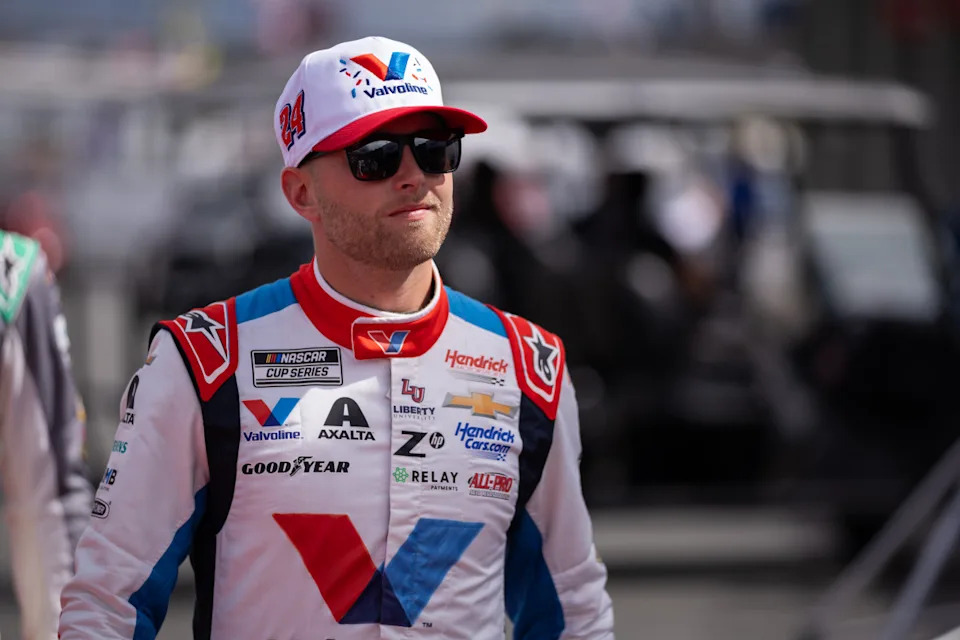 NASCAR Cup Series driver William Byron (24) heads into the drivers meeting at Charlotte Motor Speedway Road Course.Scott Kinser-Imagn Images