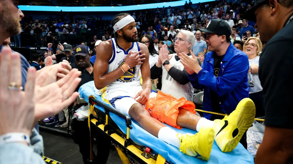 Warriors’ Moses Moody has to be stretchered off court after gruesome knee injury