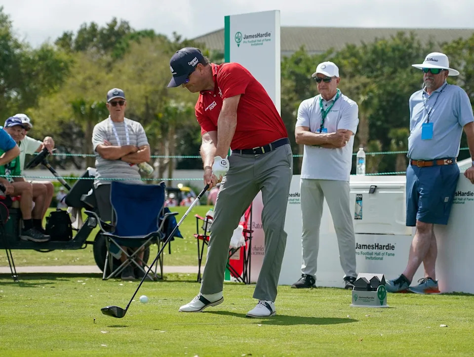 Zach Johnson plays his tee shot on the first hole in his first tournament on the PGA Tour Champions during the opening round of the James Hardie Pro Football Hall of Fame Invitational at The Old Course at Broken Sound Club on Friday, March 6, 2026, in Boca Raton, FL.