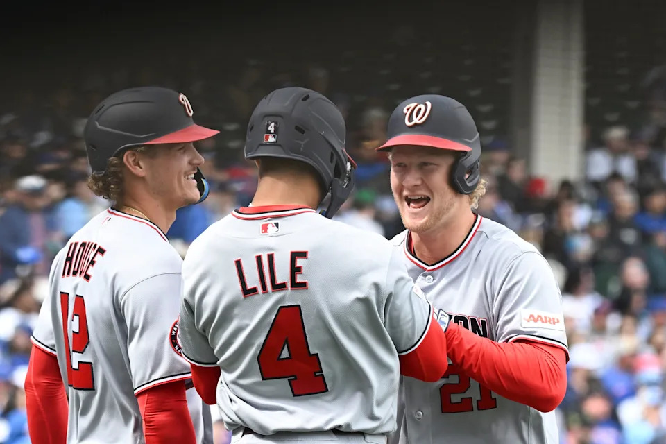 Nationals outfielder Joey Wiemer, right, celebrates a three-run homer against the Cubs that scored teammates Brady House and Daylen Lile. Wiemer recorded six hits in his first six at-bats of the 2026 season.