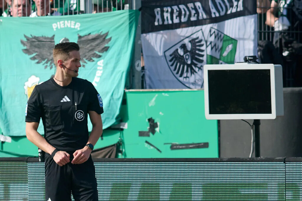 Masked fan unplugs VAR monitor at German soccer game to disrupt video review Masked fan unplugs VAR monitor at German soccer game to disrupt video review