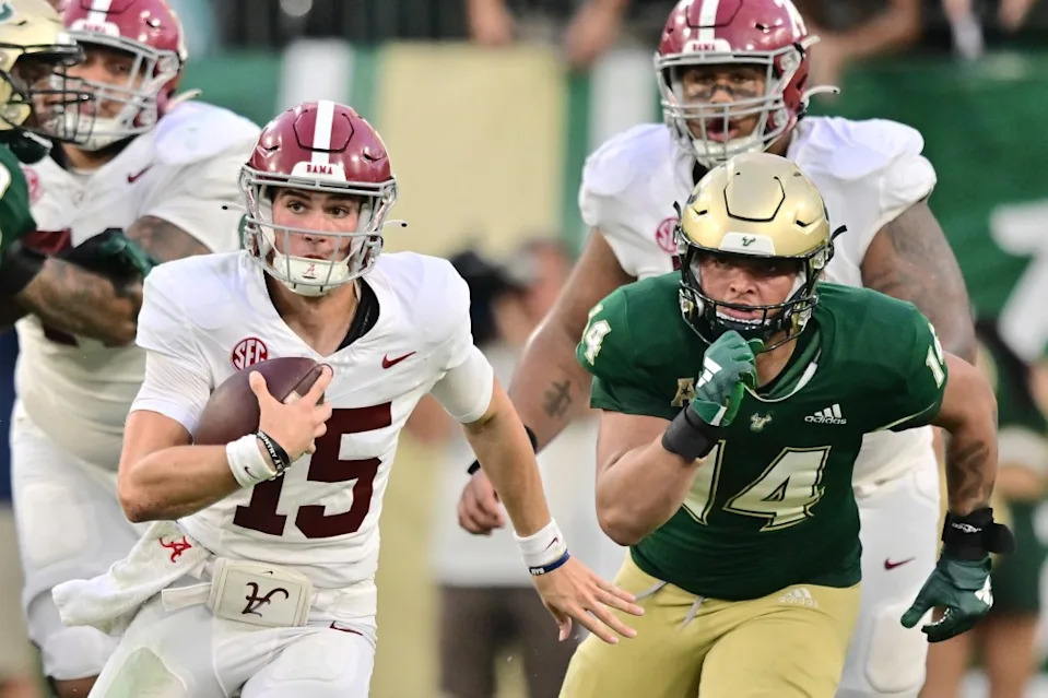 Simpson rushes the ball against Michael Williams II of South Florida at Raymond James Stadium in Tampa, 2023. Getty Images