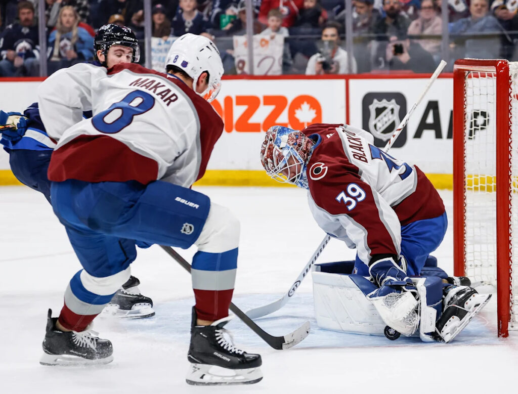 MacKinnon inches closer to 50-goal mark as Avalanche defeat Jets 3-2