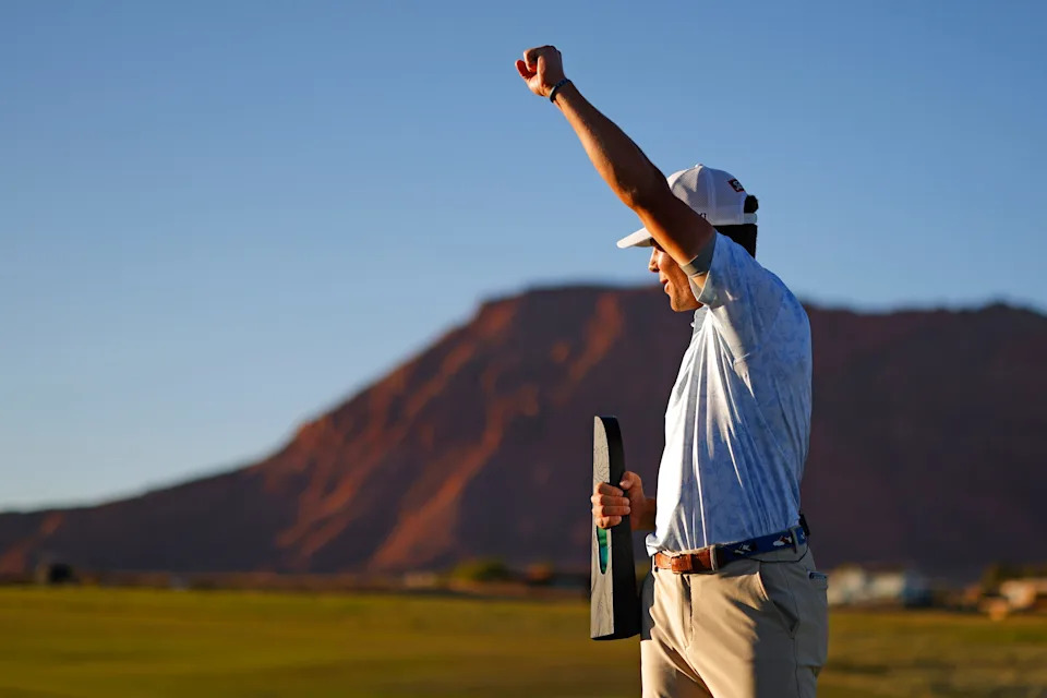 Michael Brennan poses with the trophy after winning the 2025 Bank of Utah Championship at Black Desert Resort.
