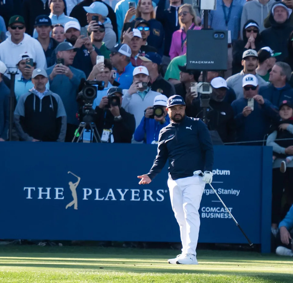 J.J. Spaun reacts to going into the water after his tee shot off on the 17th hole. Spaun make a double bogey on the hole. Rory McIlroy defeated J.J. Spaun in a three-hole aggregate playoff of the Players Championship at TPC Sawgrass Monday March 17, 2025 in Ponte Vedra Beach, Fl. McIlroy shot a +1 while Spaun shot a +3. [Doug Engle/Florida Times-Union]