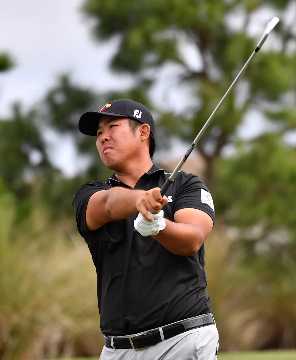 Byeong Hun An of Seoul, Korea, hits from the tee of the par 3, 253-yard, third hole on Friday, Feb. 18, 2022 during the second round of the LECOM Suncoast Classic  on the Korn Ferry Tour at Lakewood National Golf Club. 