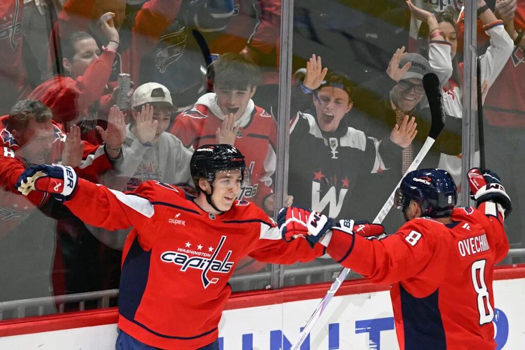 Defenseman Cole Hutson impresses in his NHL debut, then scores at the end for the Capitals