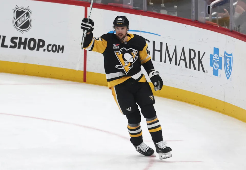 Mar 21, 2026; Pittsburgh, Pennsylvania, USA; Pittsburgh Penguins defenseman Erik Karlsson (65) celebrates his second goal of the game against the Winnipeg Jets during the third period at PPG Paints Arena. Mandatory Credit: Charles LeClaire-Imagn Images
