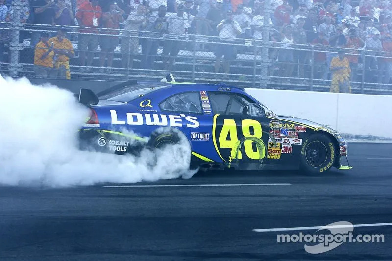 Race winner Jimmie Johnson celebrates