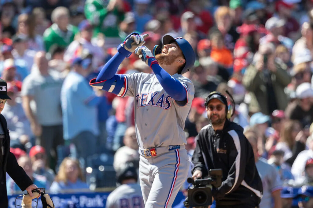 Gore wins 1st start, Nimmo and McCutchen hit 1st homers for Rangers in blowout of Phillies