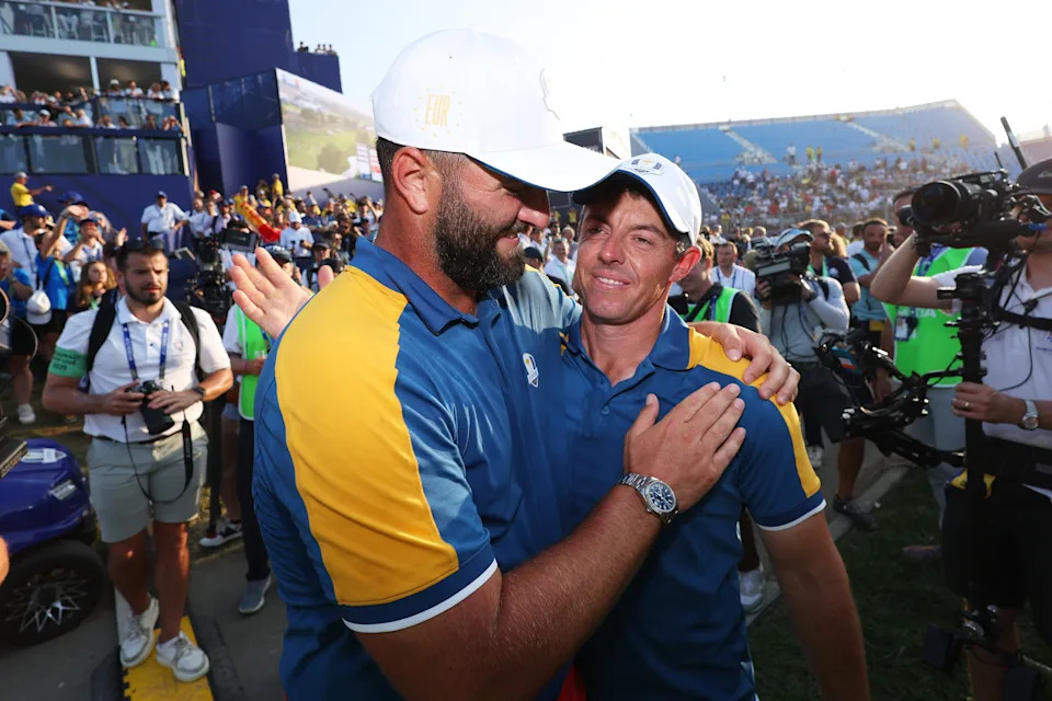 Rory McIlroy and Jon Rahm of Team Europe celebrate following victory at the 2023 Ryder Cup at Marco Simone Golf Club on October 01, 2023 in Rome, Italy.