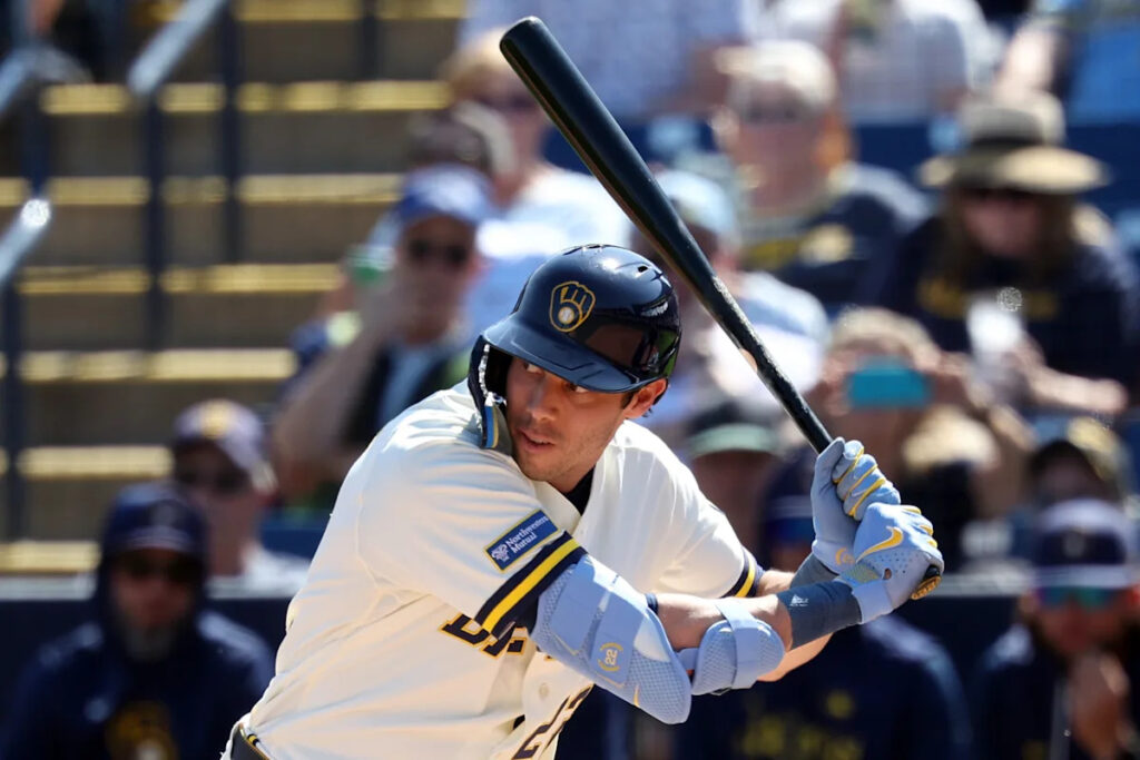 Trio of home runs leads Brewers to 11-4 win over Rangers