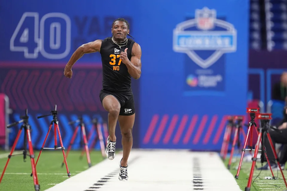 Ohio State wide receiver Carnell Tate (37) runs the 40-yard dash at the NFL football scouting combine in Indianapolis, Saturday, Feb. 28, 2026. (AP Photo/Michael Conroy)