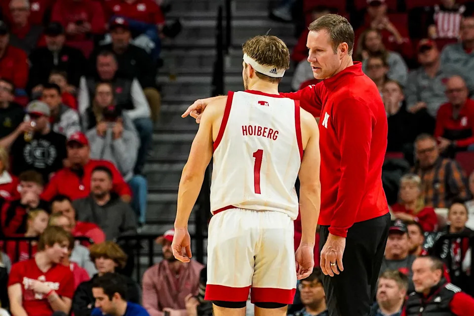 Nebraska Cornhuskers guard Sam Hoiberg (1) and head coach Fred Hoiberg talk during the second half against the Michigan State Spartans at Pinnacle Bank Arena on Dec. 10, 2023, in Lincoln, Nebraska.