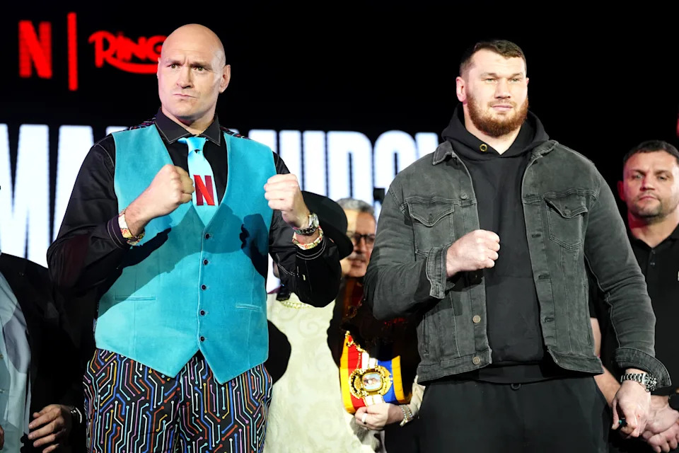Tyson Fury (left) and Arslanbek Makhmudov face off during a press conference at the Tottenham Hotspur Stadium, London. Picture date: Monday February 16, 2026. (Photo by Adam Davy/PA Images via Getty Images)