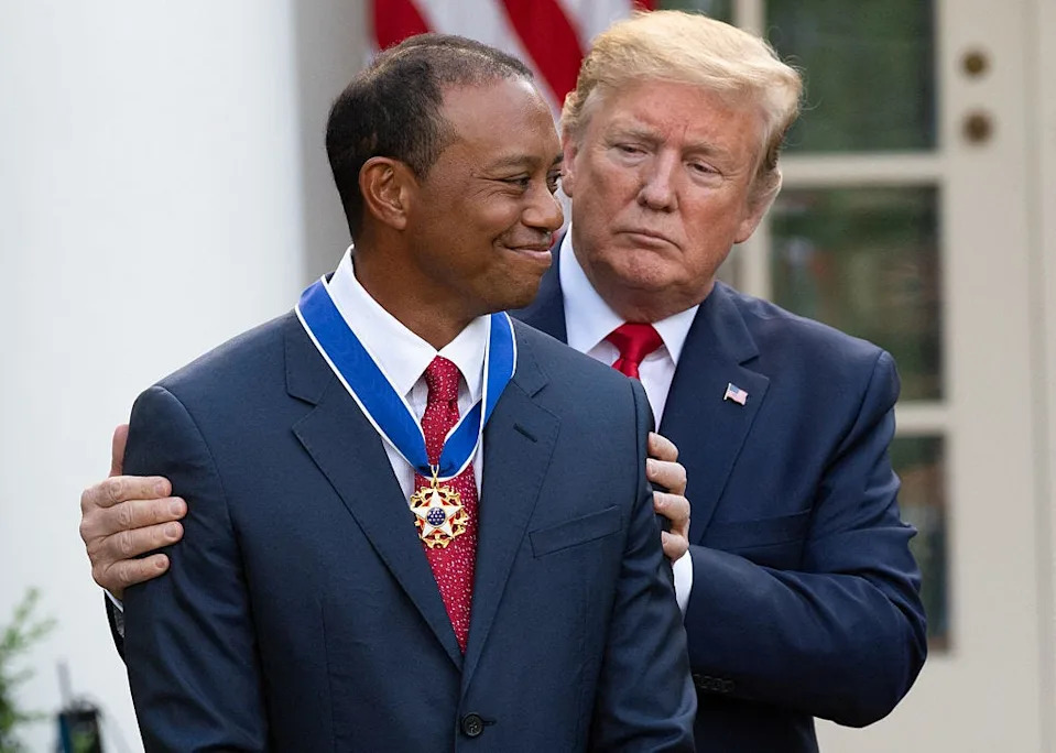US President Donald Trump presents US golfer Tiger Woods with the Presidential Medal of Freedom during a ceremony in the Rose Garden of the White House in Washington, DC, on May 6, 2019. (Photo by SAUL LOEB / AFP via Getty Images)