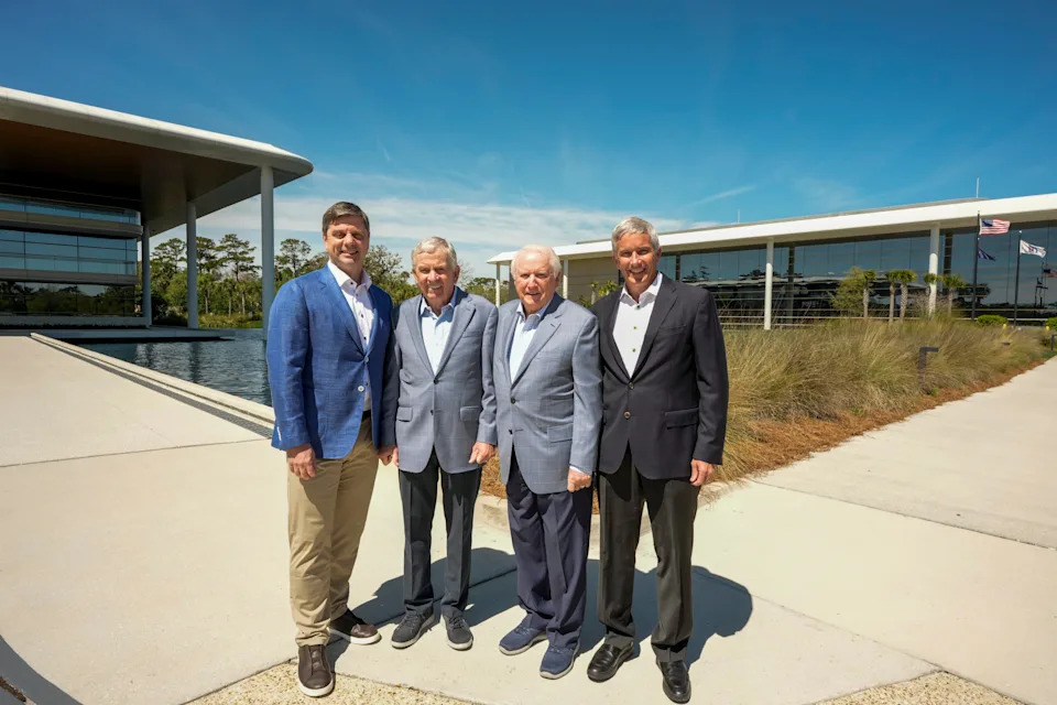 PONTE VEDRA BEACH - MARCH 17: Brian Rolapp, Tim Finchem, Deane Beman and Jay Monahan pose in the front of the Global Home and Studios buildings on March 17, 2026 in Ponte Vedra Beach, Florida. (Photo by Tracy Wilcox/PGA TOUR)