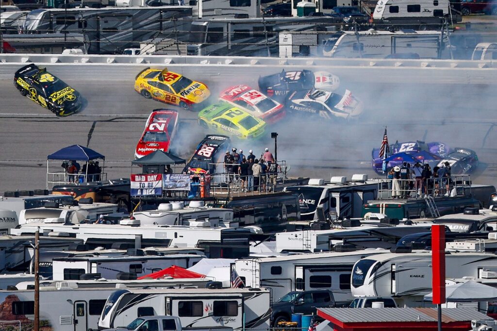 At least 25 cars wreck in massive crash, stopping Talladega Cup race