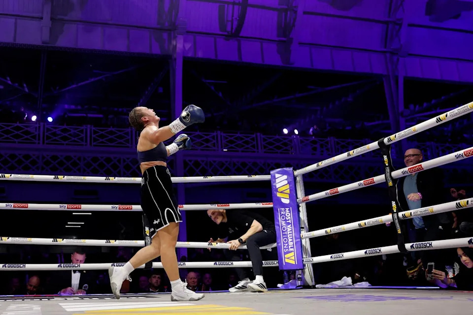 Scotney after the final bell of her 10-round shootout with Flores (Reuters)