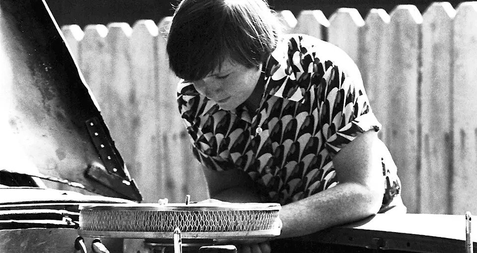 A young Mark Martin looks under the hood in an Arkansas scene from 1974