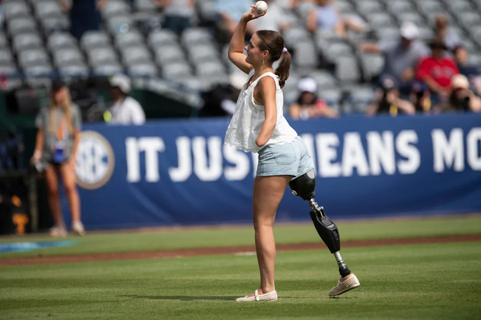Shark attach survivor, Lulu Gribbin, throws out the first pitch before Vanderbilt Commodores take on Tennessee Volunteer during the SEC baseball tournament at Hoover Met in Birmingham, Ala., on Saturday, May 24, 2025. Vanderbilt Commodores defeated Tennessee Volunteer 10-0 in 7 innings.
