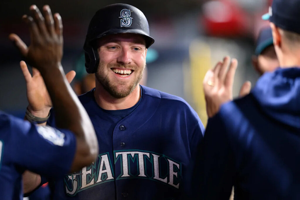 Mariners score three runs, two broken bats, beat Angels in extras