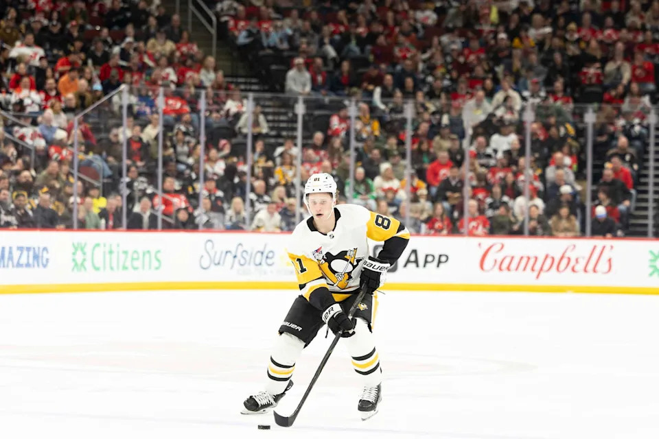 Apr 9, 2026; Newark, New Jersey, USA; Pittsburgh Penguins center Ben Kindel (81) skates with the puck against the New Jersey Devils during the first period at Prudential Center. Mandatory Credit: Luther Schlaifer-Imagn Images