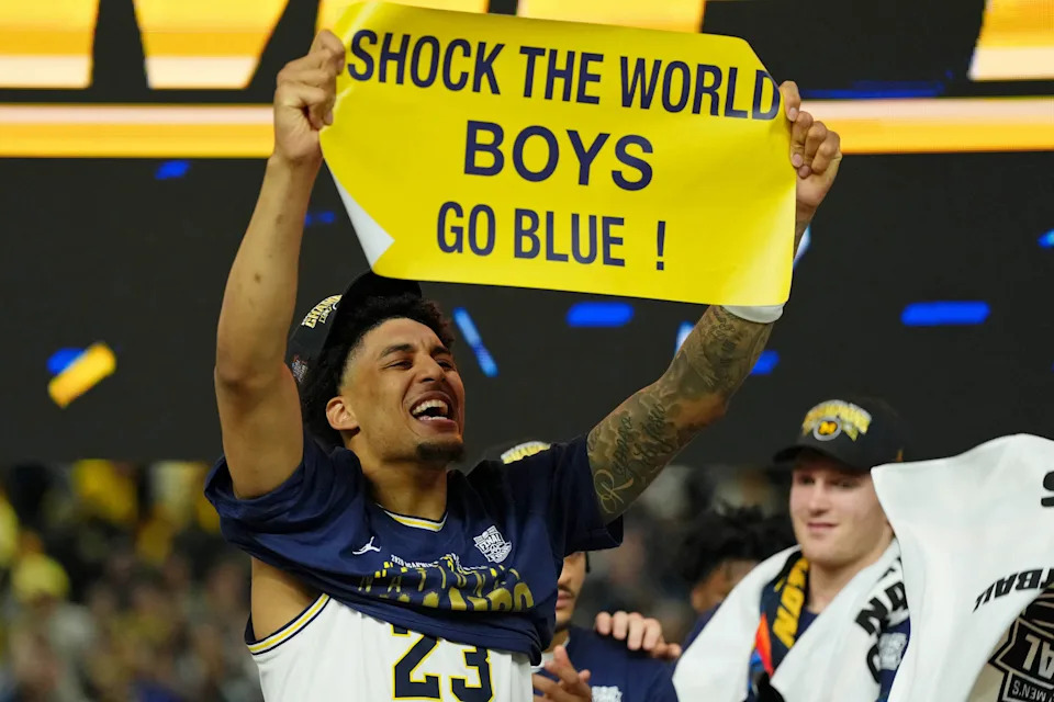 Apr 6, 2026; Indianapolis, IN, USA; Michigan Wolverines forward Yaxel Lendeborg (23) celebrates after their win against the UConn Huskies in the national championship of the Final Four of the men's 2026 NCAA Tournament between the  and the Michigan Wolverines at Lucas Oil Stadium. Mandatory Credit: Bob Donnan-Imagn Images