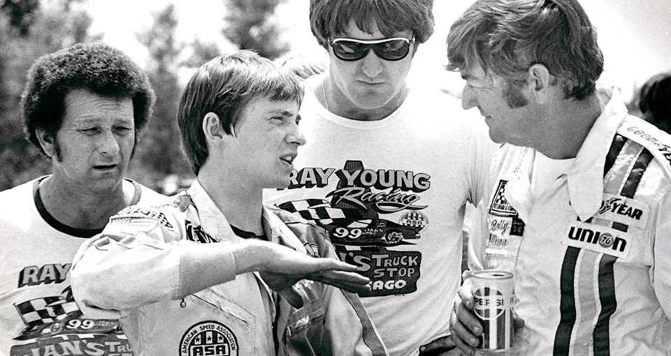 Mark Martin offers some feedback to Bobby Allison, in town at Madison for an ARTGO event, driving for Ray Young, at left.