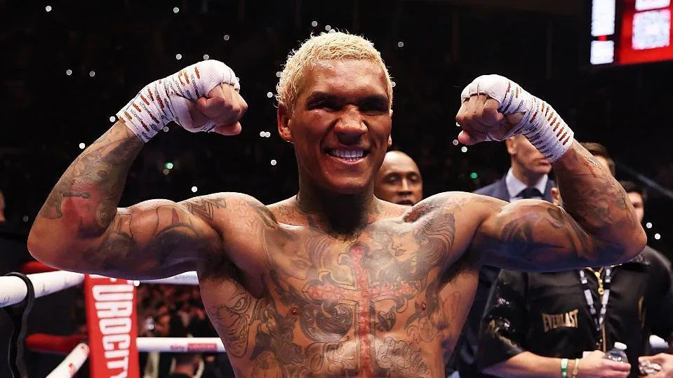 Conor Benn flexes celebrating his win