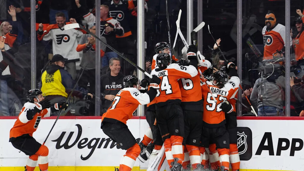 Cam do! Flyers are sky high after York scores OT winner, launches stick into stands and beat Pens