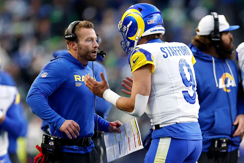 Sean McVay talks with Matthew Stafford during the NFC title game in January.