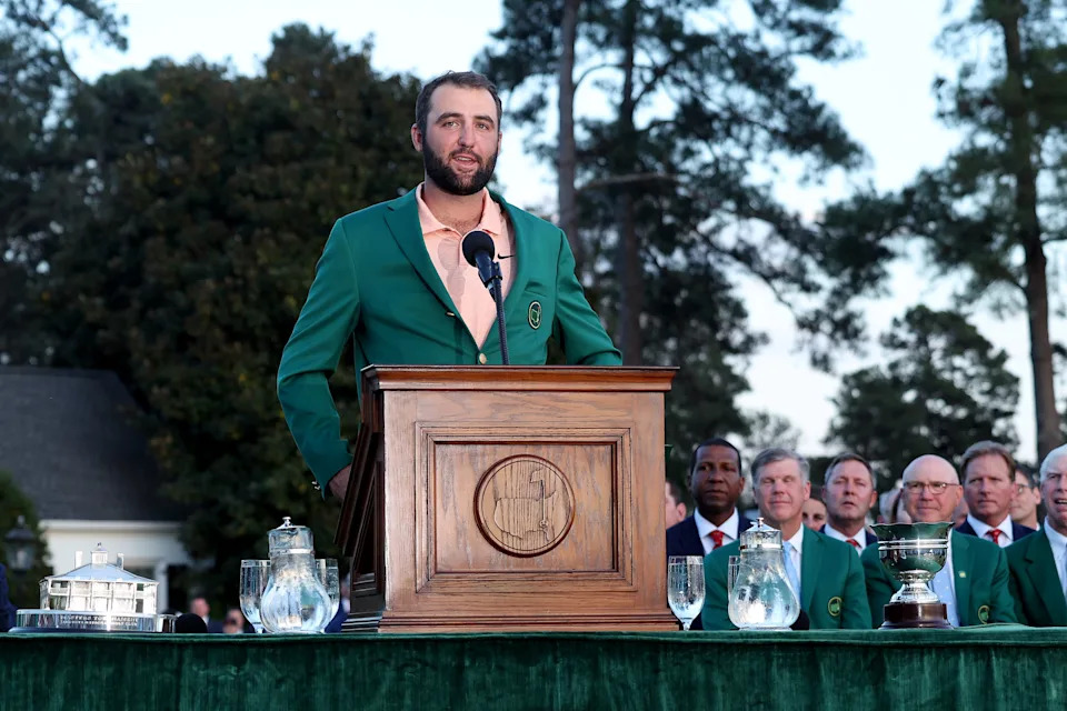 AUGUSTA, GEORGIA - APRIL 14: Scottie Scheffler of the United States speaks to the crowd during the Green Jacket Ceremony after winning the 2024 Masters Tournament at Augusta National Golf Club on April 14, 2024 in Augusta, Georgia. (Photo by Jamie Squire/Getty Images)