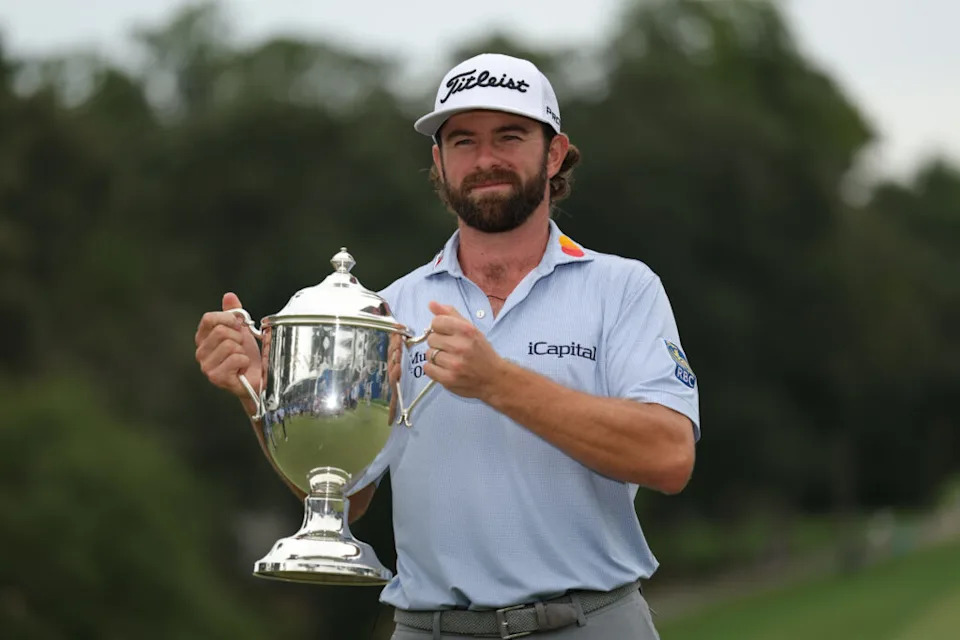 Aug 3, 2025; Greensboro, North Carolina, USA; Cameron Young with the Sam Snead Cup after the final round of the Wyndham Championship golf tournament. Mandatory Credit: Allison Lawhon-Imagn Images