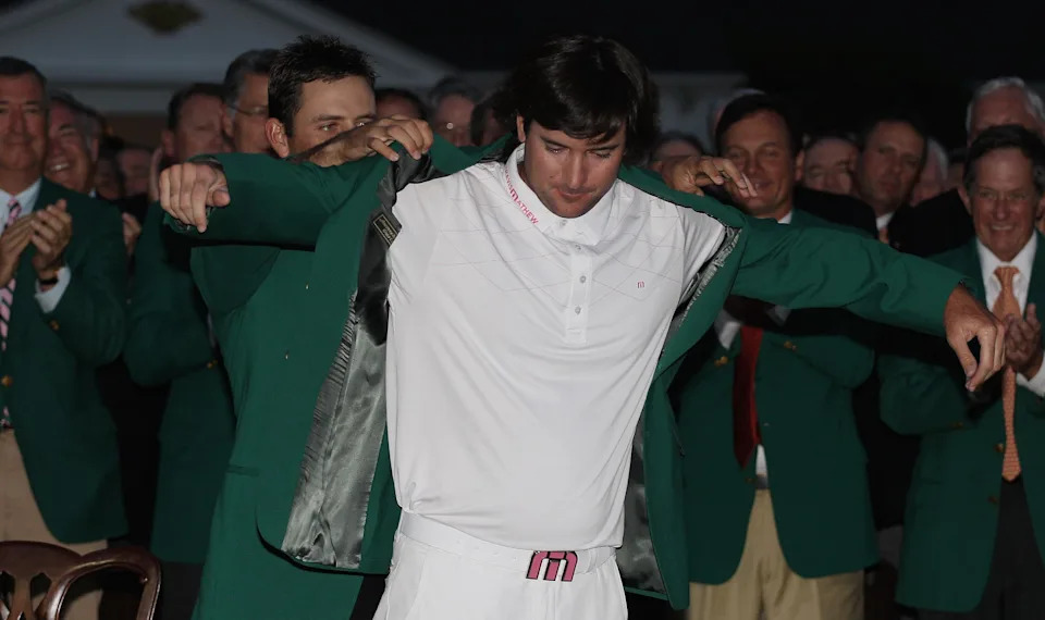 AUGUSTA, GA - APRIL 08:  Bubba Watson celebrates in his green jacket with Charl Schwartzel during The Masters at Augusta National Golf Club on April 8, 2012 in Augusta, Georgia.  (Photo by Scott Halleran/Getty Images for Golfweek)
