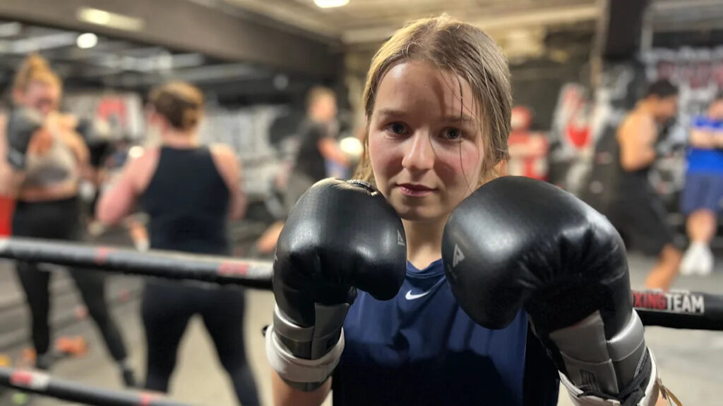 Boxing teen beat panic attacks to lift major title