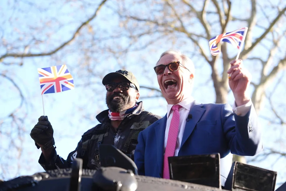 Chisora (left) arrived to his press conference with Reform UK leader Nigel Farage in a tank (Adam Davy/PA) (PA Wire)