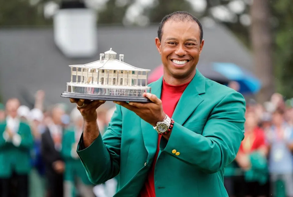 Tiger Woods celebrates during the trophy presentation after winning the Masters Tournament at Augusta National Golf Club, Sunday, April 14, 2019, in Augusta, Georgia. ALLEN EYESTONE/FOR THE AUGUSTA CHRONICLE