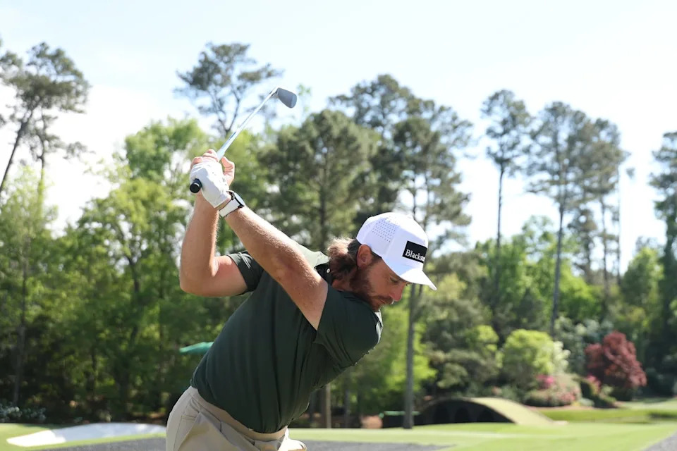 Tommy Fleetwood plays a shot from the 12th tee during a practice round at Augusta National (Getty)
