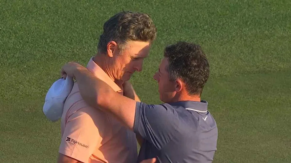 Justin Rose and Rory McIlroy talk at the Masters