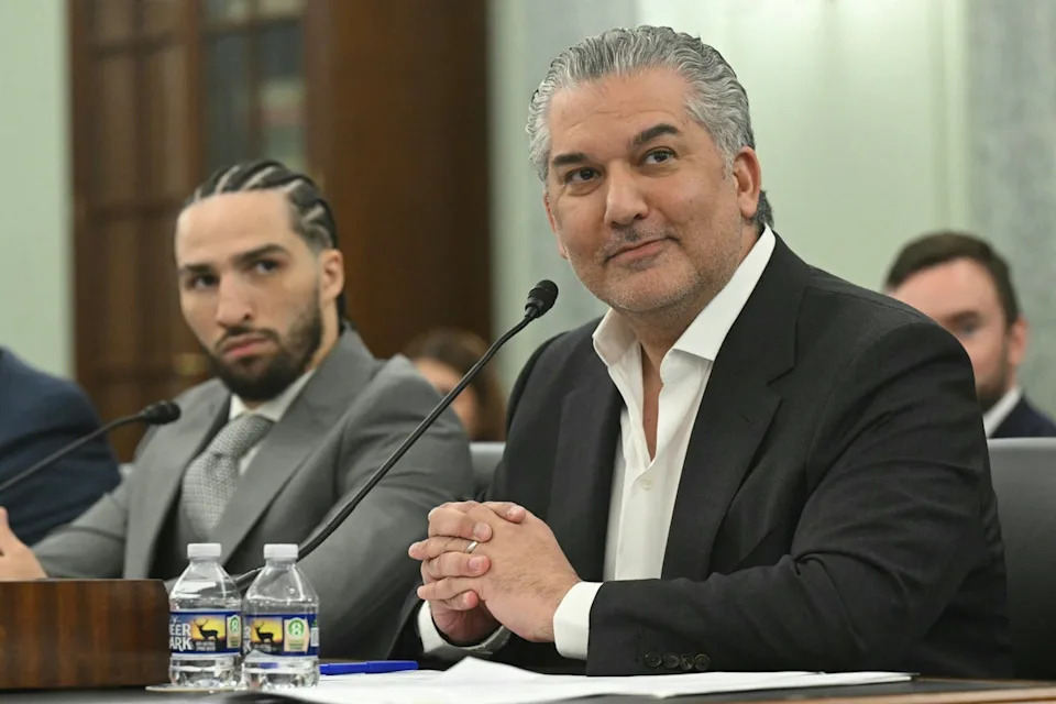 Nick Khan (right) and Nico Ali Walsh (AFP/Getty)