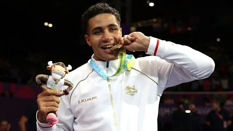 Delicious Orie bites into his Commonwealth gold medal