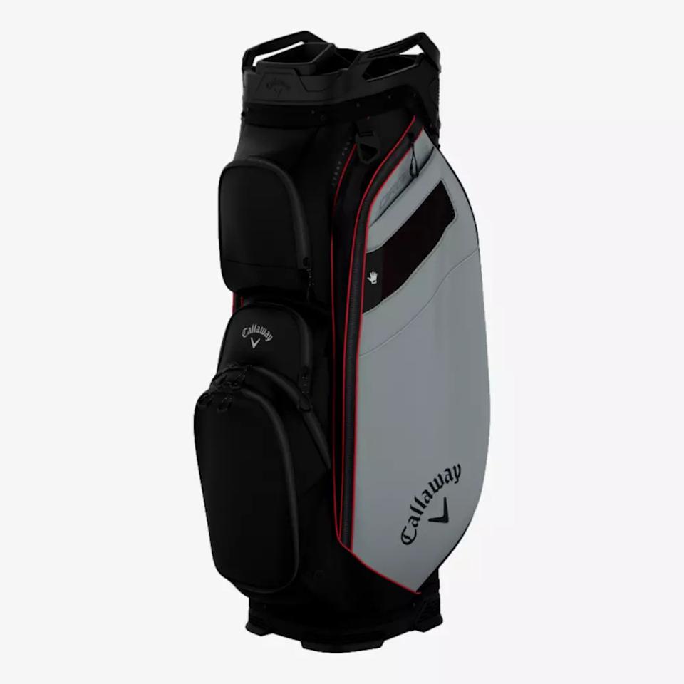 A Callaway golf bag in black and gray with red accents, featuring multiple zippered pockets and the Callaway logo on the front—an ideal choice for those seeking the best golf bags 2026, standing upright against a plain background.